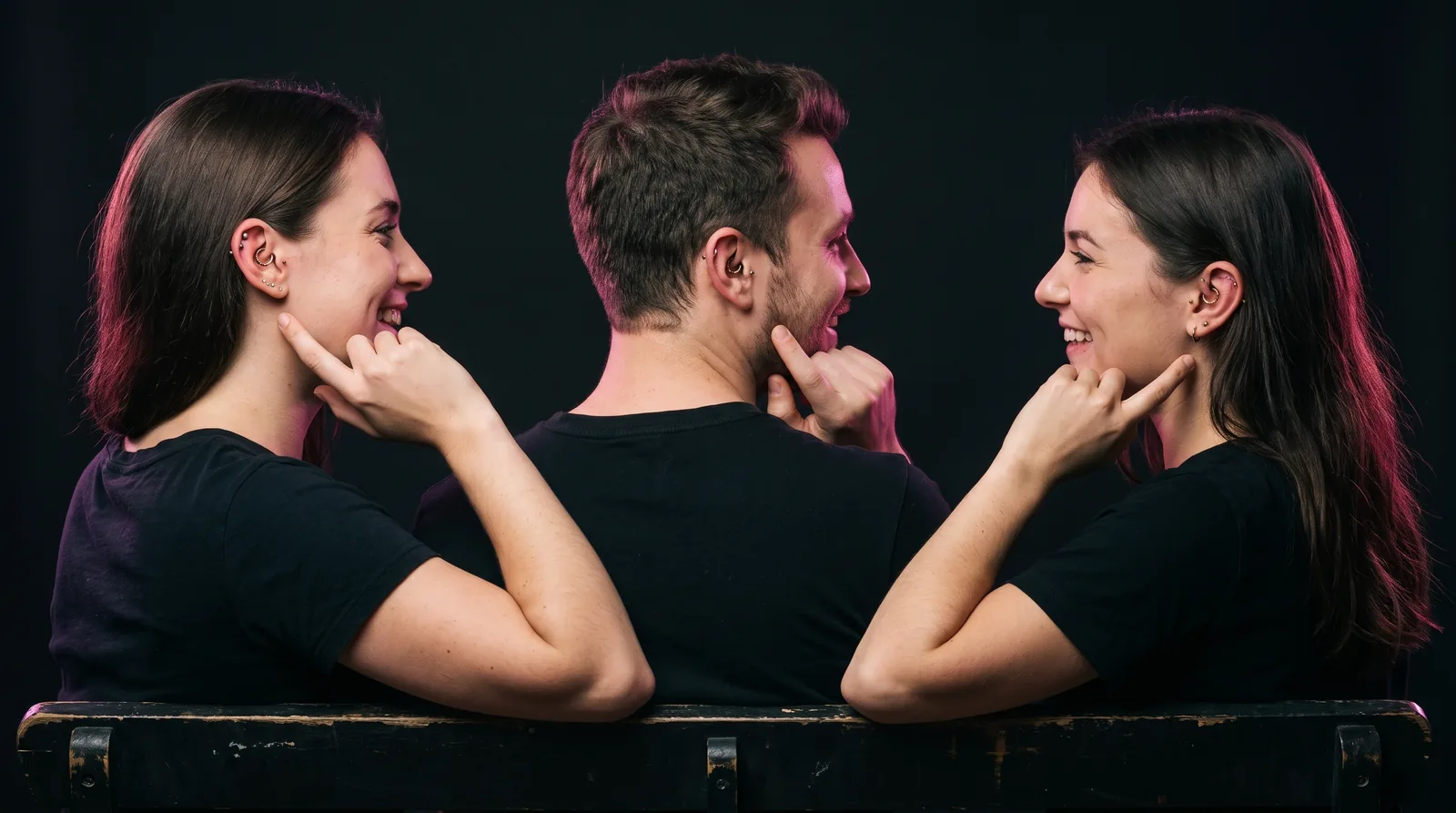 Three friends comparing fresh ear piercings and jewelry together after a group session